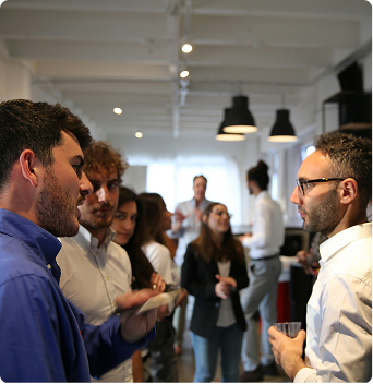Image of people casually talking and networking