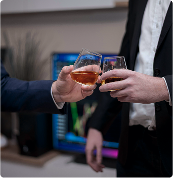 Image of drink glasses clinking together