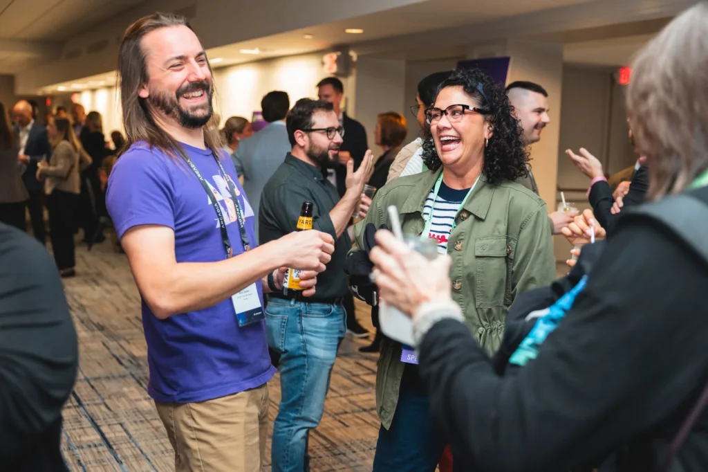 aggregate-2026-philadelphia-attendees-laughing-at-networking-reception