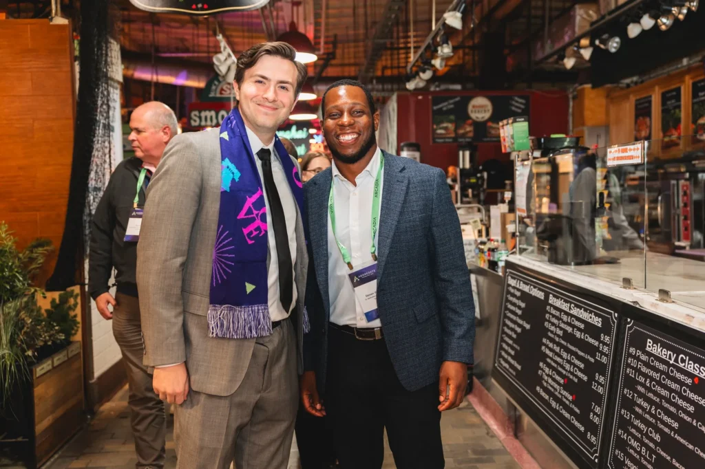 aggregate-2026-philadelphia-attendees-posing-with-love-scarf-at-reading-terminal-market